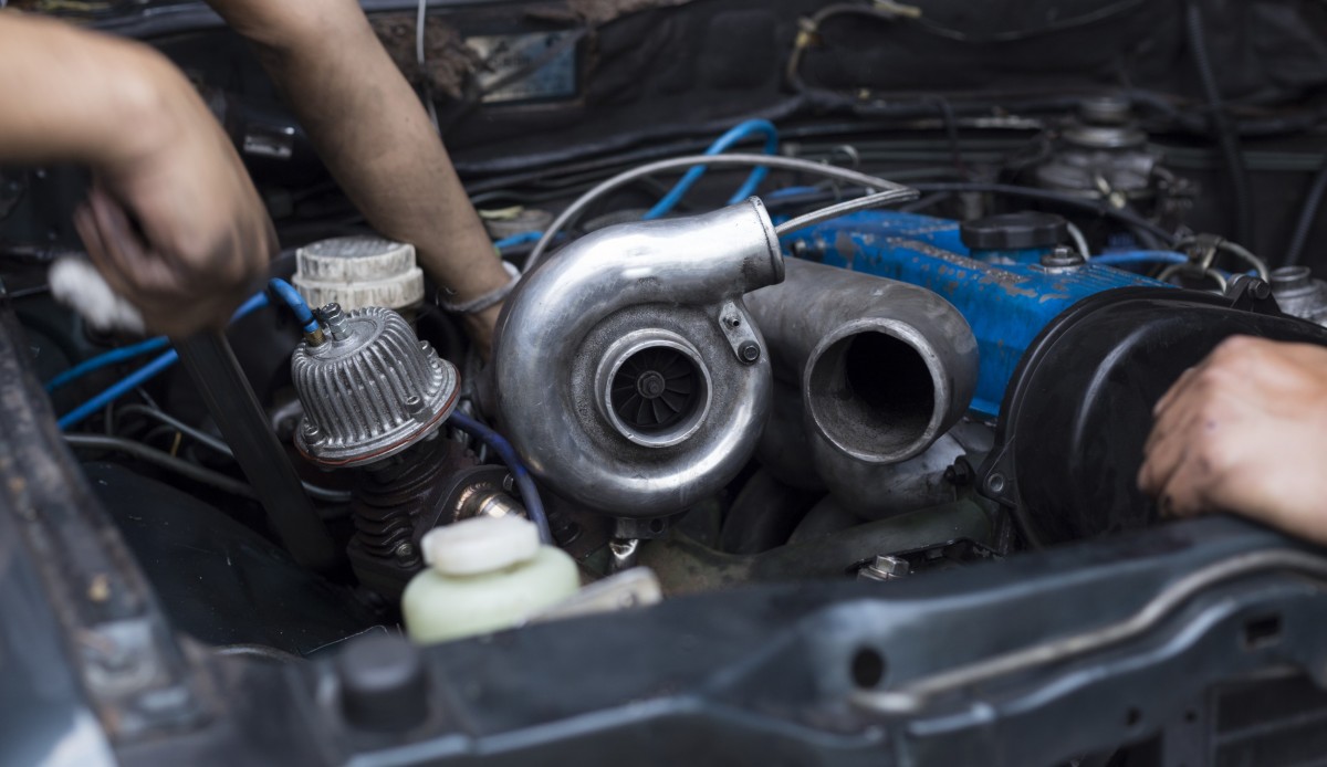 turbocharger under hood of car
